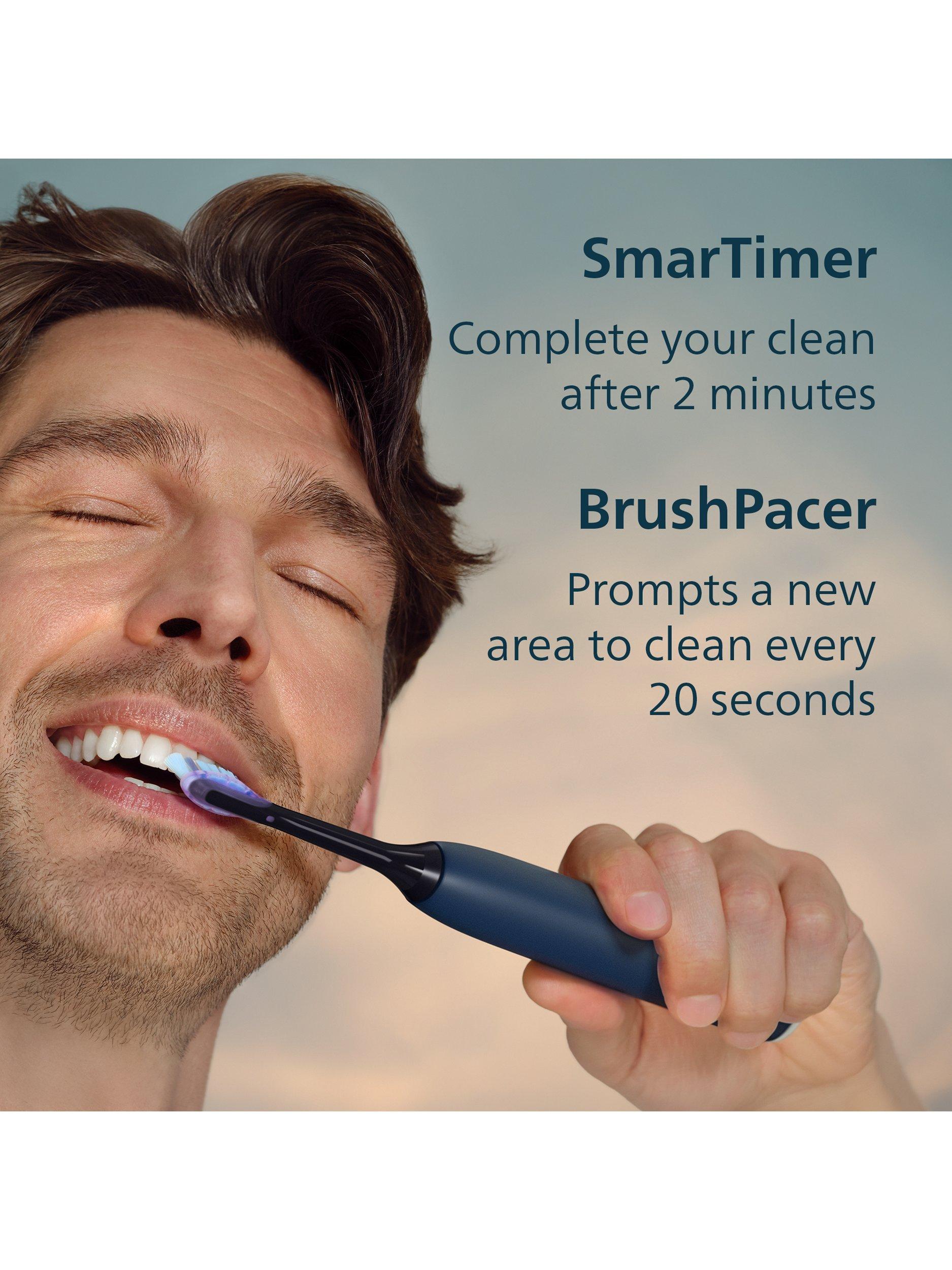 Sonicare 7100 Series HX7423/08d Electric Toothbrush with 4 Replacement Brush Heads, Navy